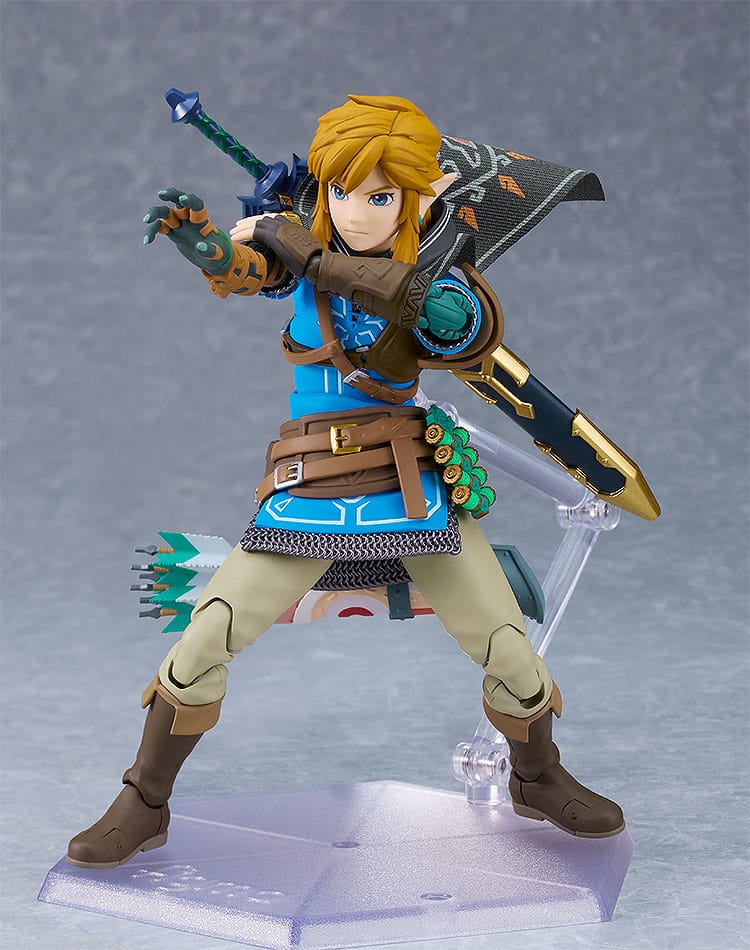 figma Link in a fighting stance with the Hylian Hood cape, front view on display stand