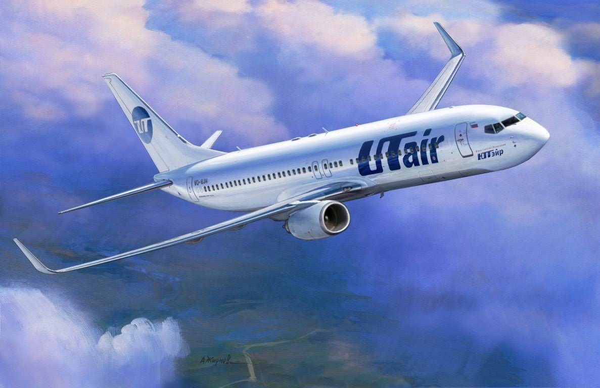 Zvezda 1/144 Boeing 737-800 model kit artwork of a UTair liveried airliner above the clouds