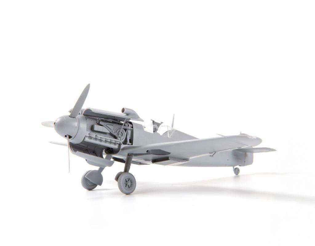 Zvezda 1:48 Messerschmitt Bf-109 F2 kit, unpainted model showing exposed engine, front three-quarter