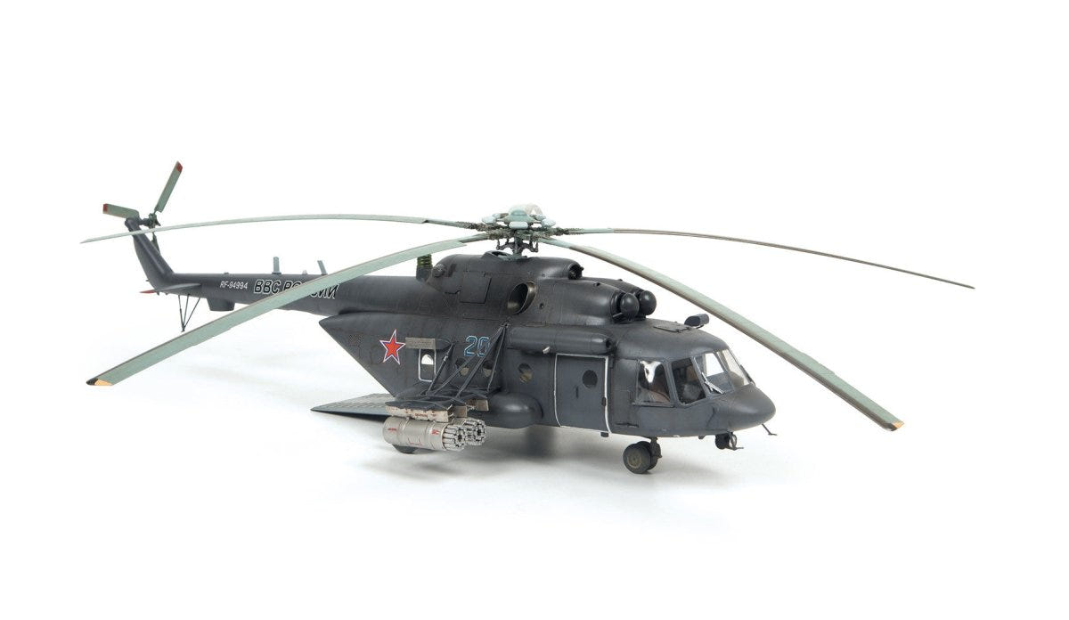 Zvezda 1/48 Mi-171Sh military transport helicopter model built in dark grey with red stars